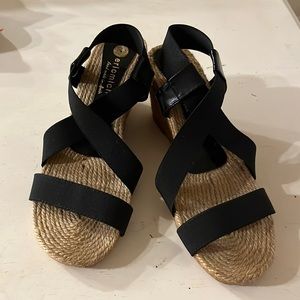 Strappy Eric Michael espadrilles.